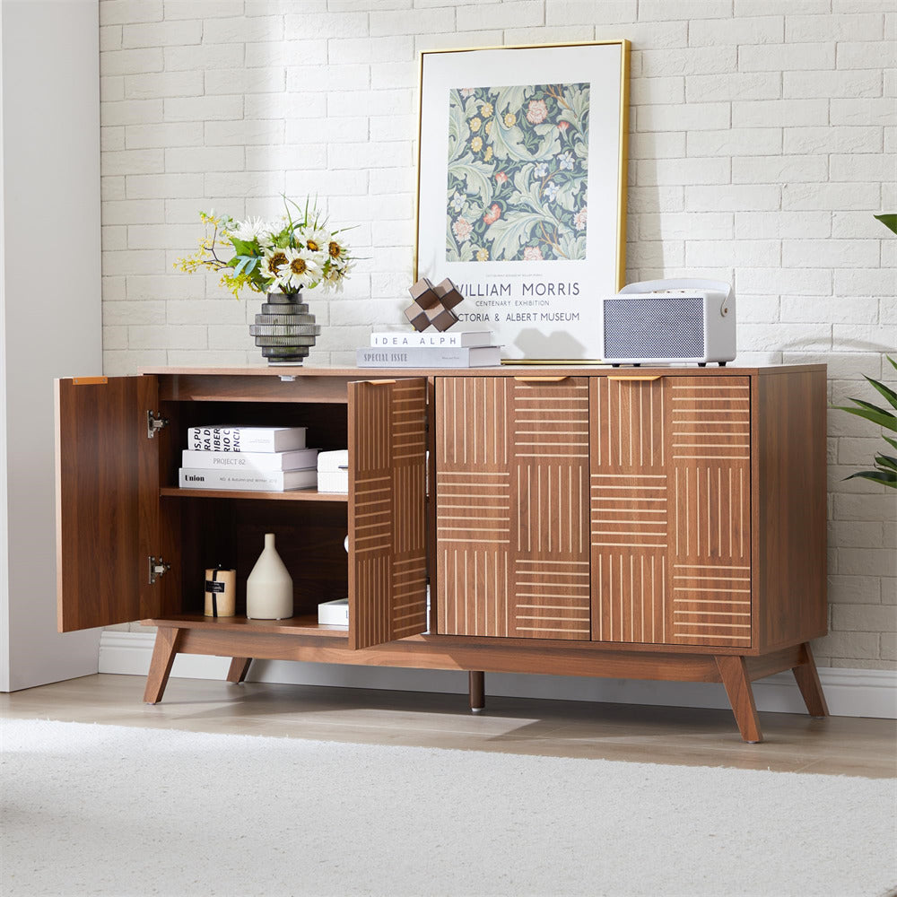 Wooden sideboard with decorative items in a room with a white tiled wall.