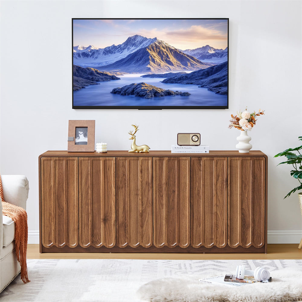 Wooden console table with decorative items in a living room setting