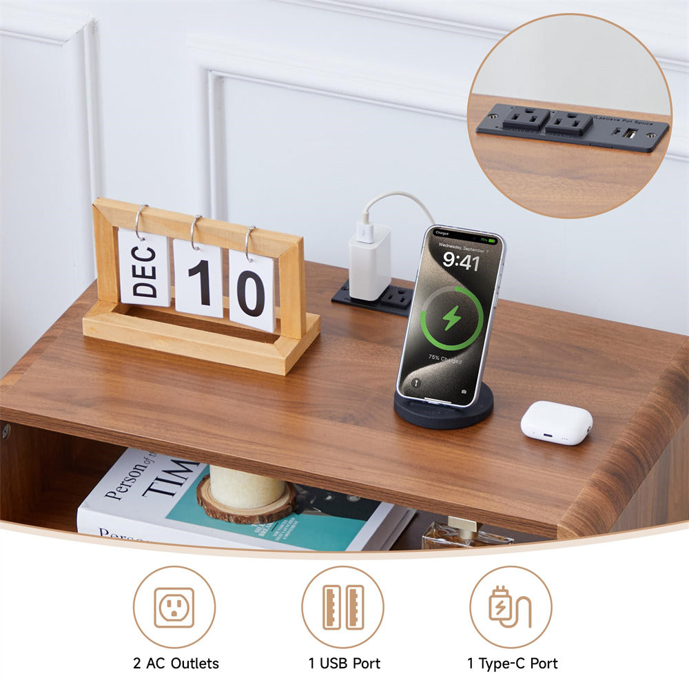Wooden desk with charging station, phone, and calendar on a white wall background