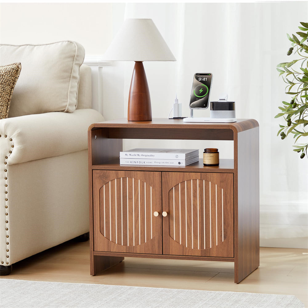 Wooden side table with decorative items in a living room setting