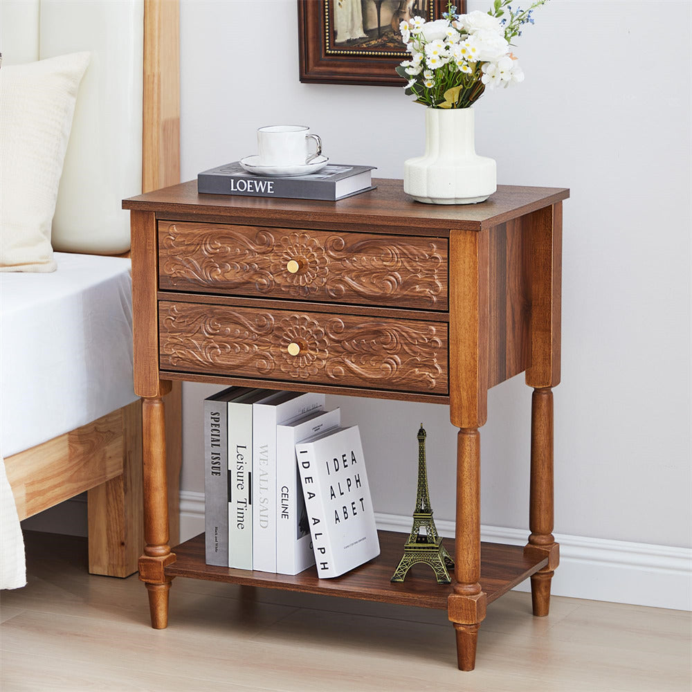 Wooden nightstand with books and a vase in a bedroom setting