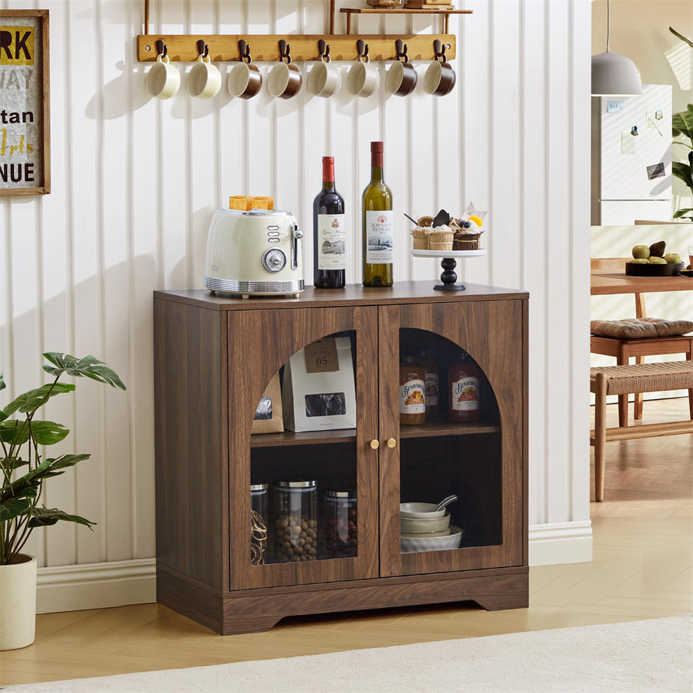 Wooden cabinet with glass doors displaying kitchen items in a home setting