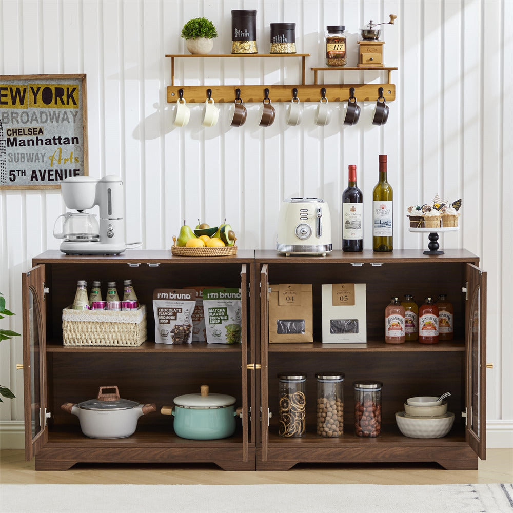 Wooden kitchen cabinet with various items including bottles, fruits, and kitchen appliances.