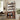 Wooden bookshelf with decorative items in a home office setting