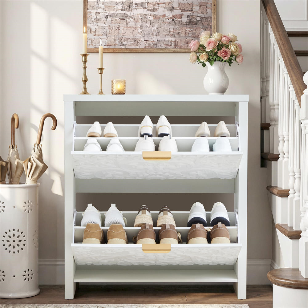 White shoe rack with organized shoes in a home setting with decor elements.