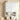 White wall-mounted cabinet with decorative patterns on a beige wall.