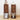 Two wooden nightstands with decorative items on a light background