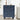 Navy blue three-drawer nightstand with gold knobs in a room setting.