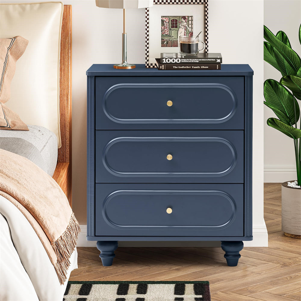 Blue nightstand with three drawers in a bedroom setting