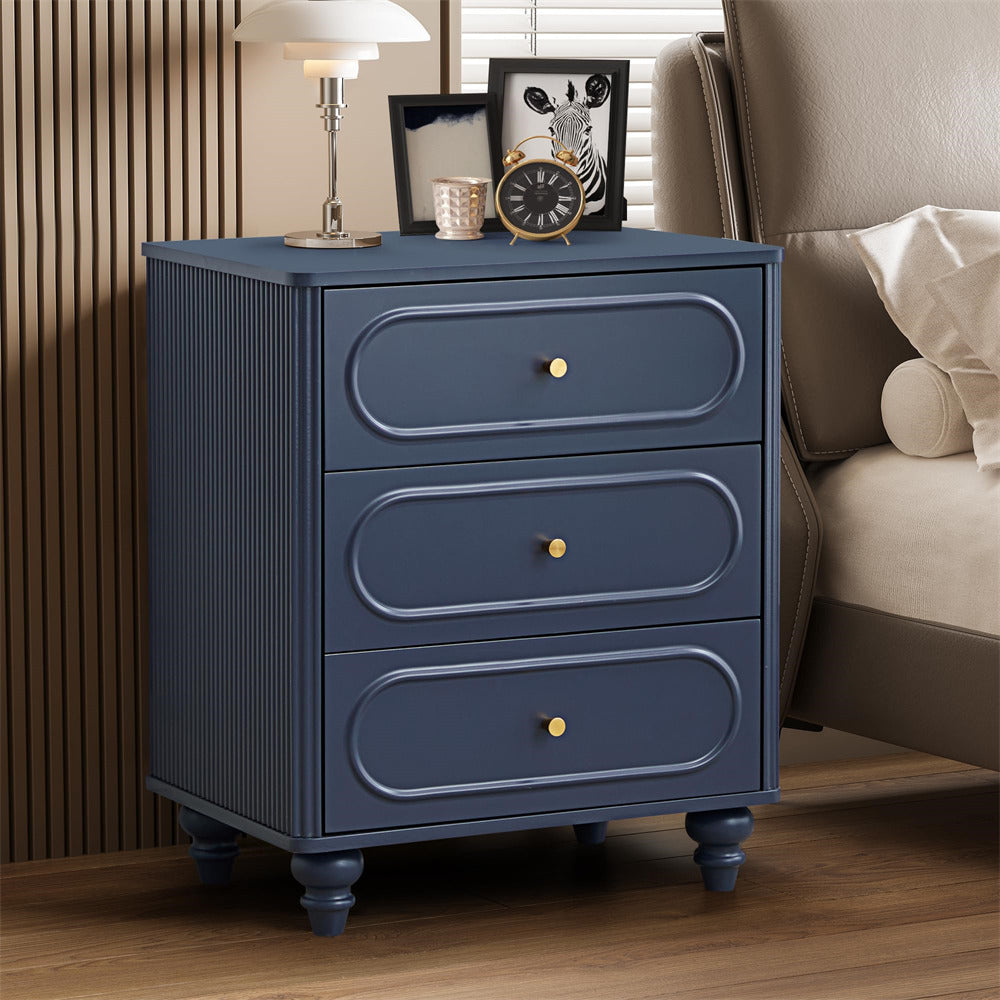 Blue nightstand with three drawers in a bedroom setting